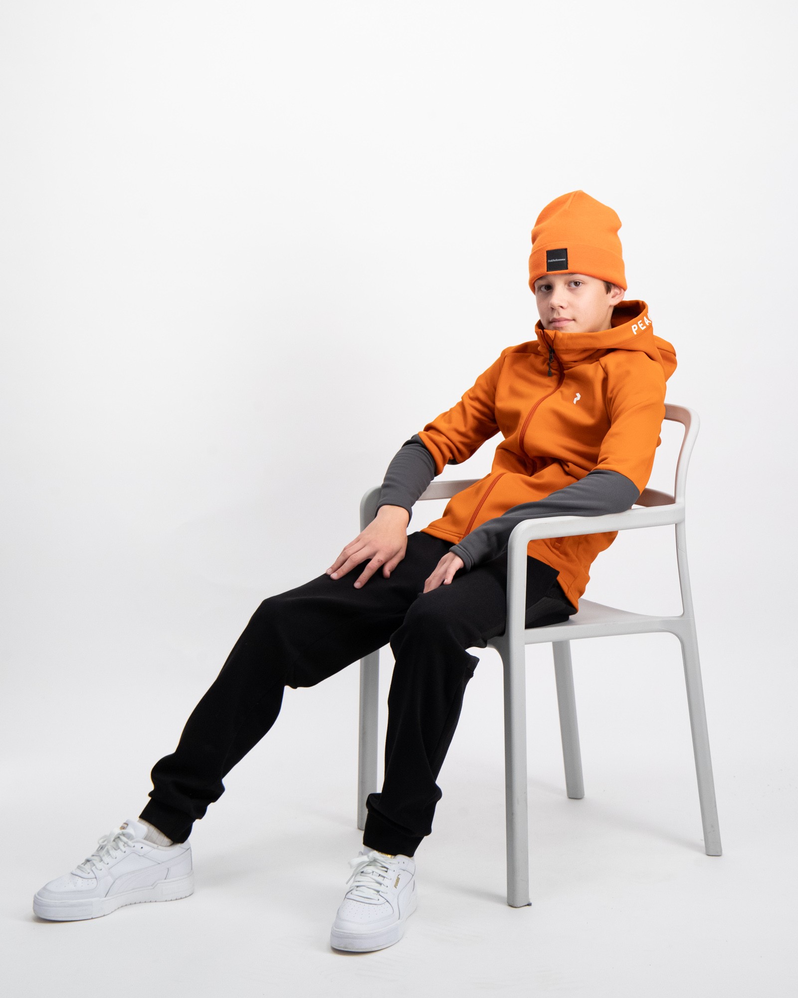 Peak Performance Jr Rider Zip Hood Orange för Kille | Kids Brand Store